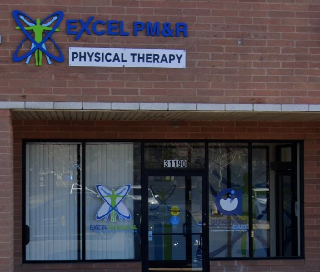 Entrance and storefront signage at Excel PM&R Physical Therapy, suite 31190