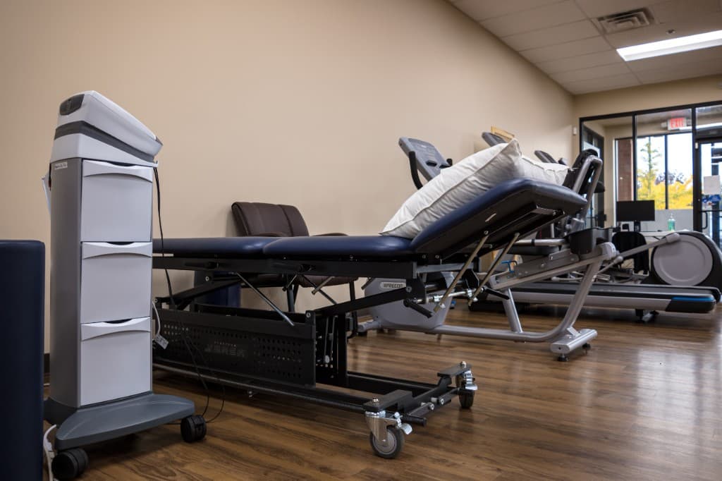 Mechanical traction therapy table and treatment equipment at Excel PM&R